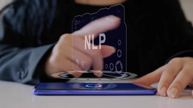 Female hand interacts HUD hologram with text NLP. Woman in black uses conceptual holographic technology of the future on the screen of a smartphone lying on a table