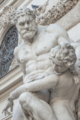 Statue of fight of Hercules with a club and Hippolyte, and Amazonian queen from Classical Greek Mythology, Hofburg Palace, outdoor, Vienna, Austria, details, closeup