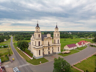 Fototapeta na wymiar The view of Catholic church in Budslav, Belarus. Drone aerial photo