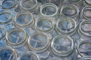 Sorting and collection of glass containers for recycling and reuse.