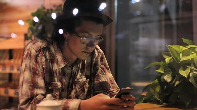 Portrait Of Stylish Man With Mobile Phone At Cafe, Young Male With Smartphone