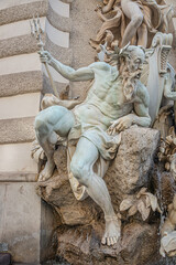 Element of Sea Power Fountain at Saint Michael square in historical downtown of Vienna, Austria