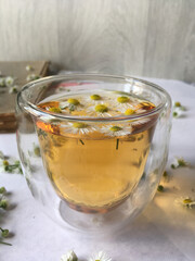 chamomile tea in a transparent cup