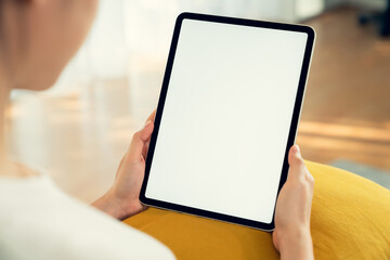 Hand holding digital tablet mockup of blank screen. Take your screen to put on advertising. - obrazy, fototapety, plakaty