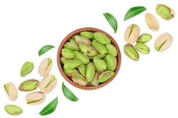 pistachio in wooden bowl isolated on white background with clipping path and full depth of field. Top view. Flat lay