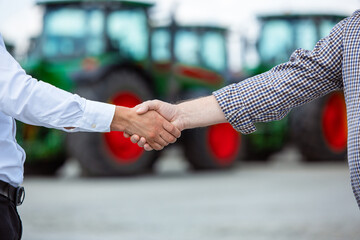 Agreement. Close up professional farmer with a modern combine. Confident, bright colors....
