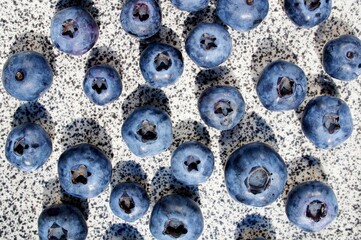 blueberries on the marble plate close up