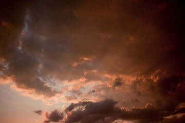 Naklejka na ściany i meble Clouds in the sunset