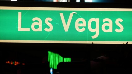 Fabulos Las Vegas, traffic sign glowing on The Strip in sin city of USA. Iconic signboard on the road to Fremont street in Nevada. Illuminated symbol of casino money playing and bets in gaming area