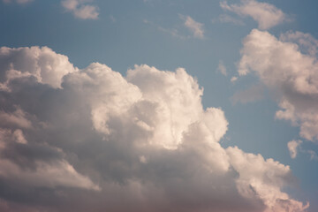 Fototapeta na wymiar Cumulus cloud formations in the sky