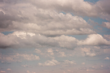 Fototapeta na wymiar Cumulus cloud formations in the sky