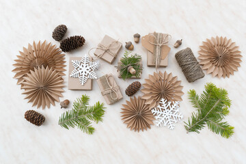 Fototapeta na wymiar Hand crafted gifts with natural Christmas decorations without plastic.