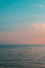 Tropical ocean and sky blue and pink gradient. Wallpaper,  copy space.