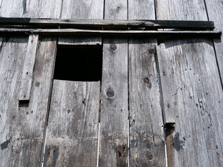 A wooden plank in an old french village. (Vosges, july 2020)