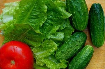 fresh vegetables on a wooden table top view close up