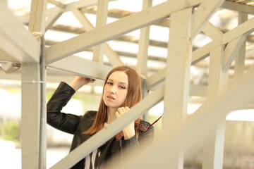 Beautiful young girl walking outdoors