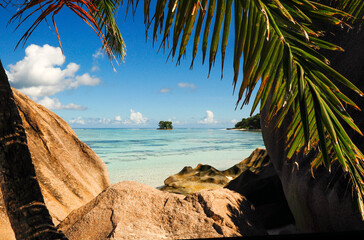 Fototapeta na wymiar Natural frame of an Idyllic tropical beach with granitic rocks in Anse Source D'argent, La Digue island, Seychelles