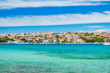Croatia, town of Novalja on the island of Pag, turquoise sea and waterfront view