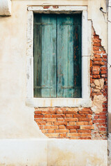 Beautiful old window and brick wall in Venice Venice italy postcard.