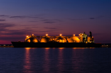 LNG TANKER - Ship at dawn moored to the gas terminal