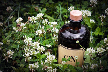 Brown glass bottle of gin or medicine ,label with unknown gin brand 