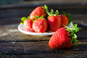 Red delicious strawberries for desserts and fresh juices in summer for ice cream