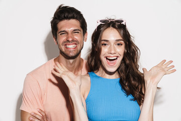 Obraz premium Image of excited caucasian couple laughing and looking at camera