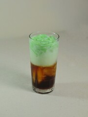 Es Dawet or Es Cendol, brown sugar soup mixed with coconut milk with the main topping made of rice flour