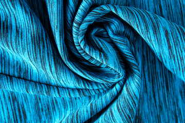 Texture of crumpled blue melange fabric.