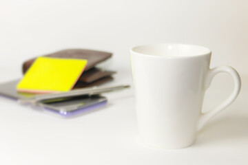 cup of coffee and yellow note