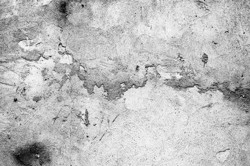 Texture of a concrete wall with cracks and scratches which can be used as a background