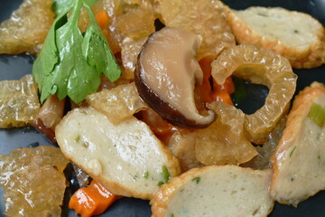  fried pork skin with slice fish line and carrot on plate
