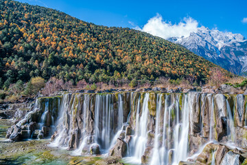 Scenery of Blue Moon Valley Waterfall in Yulong Snow Mountain, Lijiang, Yunnan, China
