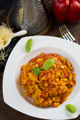 Rice and chicken breast cooked in tomato sauce.