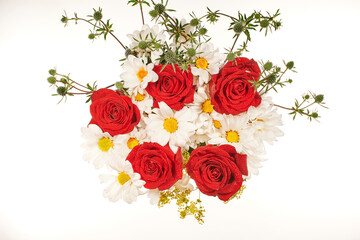 Bouquet of red roses and white daisies on a white background