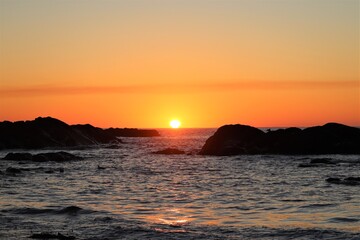 Fototapeta na wymiar Sunset over the sea, Benbecula, Outer Hebrides, Scotland