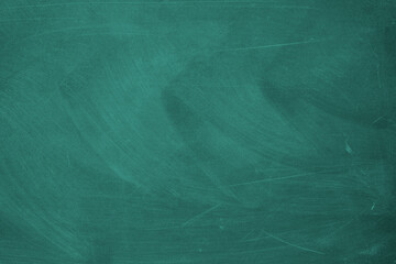 Obraz premium Texture of chalk rubbed out on blackboard or chalkboard background. School education, dark wall backdrop or learning concept.
