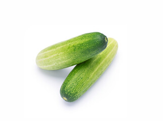 Organic cucumber With two balls stacked on a white background