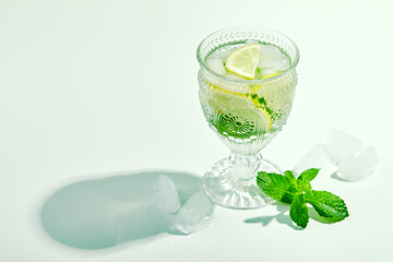 Fresh lemonade with mint and lemon in glasses