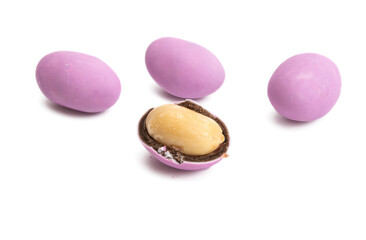Obraz na płótnie Canvas peanuts in chocolate and colored glaze