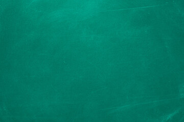 Texture of chalk rubbed out on blackboard or chalkboard background. School education, dark wall backdrop or learning concept.