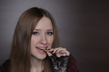 Obraz premium Beautiful young woman with black cat ears on the head