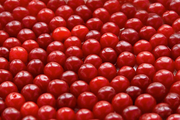 Pile of cherries fresh fruit background texture.