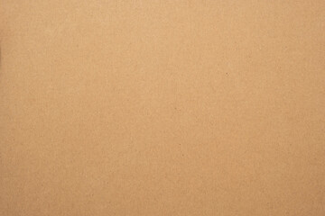 Texture of brown craft or kraft paper background, cardboard sheet, recycle paper, copy space for text.