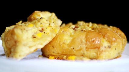 Korean garlic cheese bread on white background.