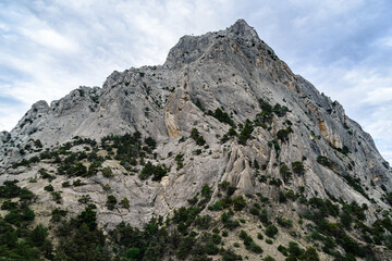 Rocky peak against blue sky