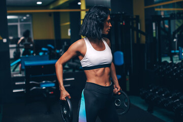 Sport. Woman sport body strong and beautiful

