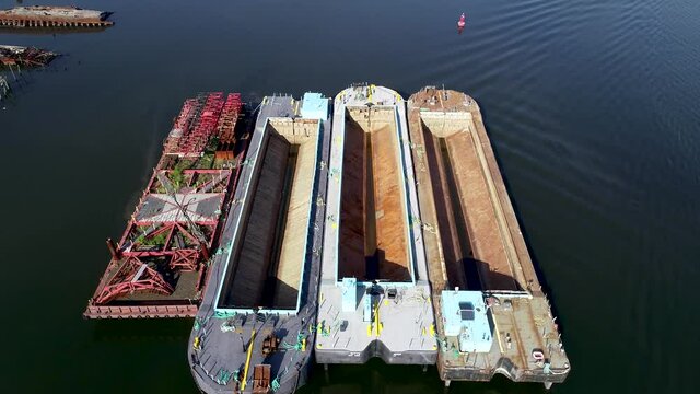 Three empty container ships along the Arthur Kill, Staten Island, near the ship graveyard