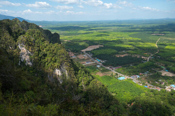 Fototapeta na wymiar View from the mountain at Tiger Cave Temple, witch is a Buddhist temple northeast of Krabi in southern Thailand. 