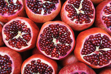 Ripe pomegranate fruits. Fruit trade in a shop. Close-up